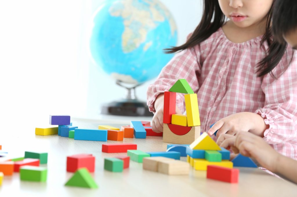 Asia preschool building block toy on the table